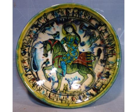 A Persian glazed ceramic bowl, decorated with a lady on horseback, dated and marked to base, H.6.5cm Diameter 27cm 