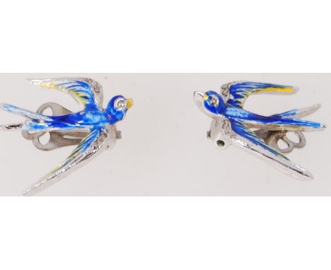 A large 1950's enamel &amp; marcasite swallow ear clips, which are a silver tone metal and blue cold paint enamel. 2.5cm.
