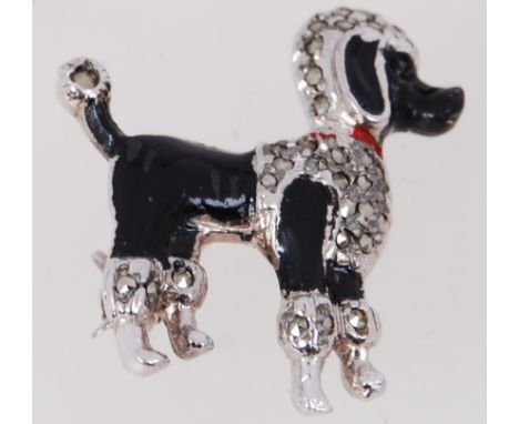 A 1950's enamel &amp; marcasite poodle brooch, with silver tone and black cold paint enamel. Marked BJL and contains roll ove