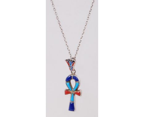 An Egyptian revival, silver ankh pendant, set with turquoise, lapis and carnelian. Chain marked Sterling, pendant unmarked. T