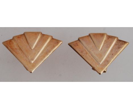 A pair of 9ct gold earrings in the Art Deco style as large stylized fans with post backs. Marked 375 test 9ct gold.
