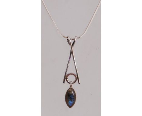 A 925 silver pendant necklace with modernist pendant strung on a box snake chain. Measures chain16 inches Pendant 2.5inches.