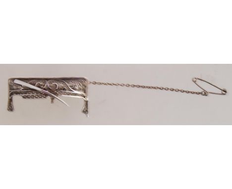 A vintage Maltese silver filigree brooch pin in the form of a boat. Maltese silver marks to c clasp, with safety chain.