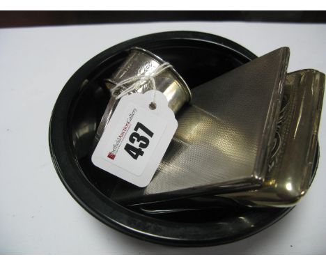 A Hallmarked Silver Cigarette Case, allover engine turned; an EPNS cigarette case and two hallmarked silver napkin rings. (4)