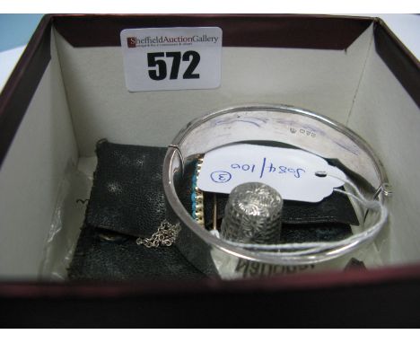 A Graduated Turquoise Set Bar Brooch, composed of eleven graduated circular turquoise cabochons, claw set; A Hallmarked Silve