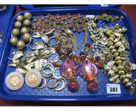 A Selection of Vintage Style Costume Jewellery, including a large ornate charm style bracelet, suspending novelty fish and sh