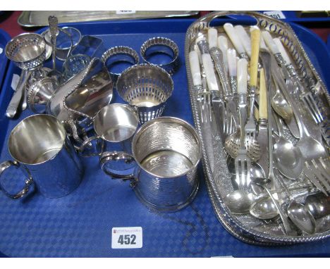 Hallmarked Silver Napkin Rings, hallmarked silver spoon, assorted plated cutlery, plated mugs, egg cup and spoon, sugar scutt