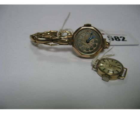 A Vintage 9ct Gold Cased Ladies Wristwatch, the unsigned dial (lacking perspex/glass) to integral expanding bracelet, (damage