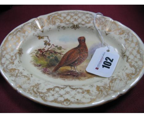 A Royal Worcester Porcelain Fluted Oval Dish, retailed by Tiffany and Co., New York, the centre painted with a grouse in a wo