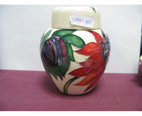 A Moorcroft Pottery Ginger Jar, painted in the 'Ruby Red' pattern, designed by Emma Bossons, impressed and painted marks, 1.5