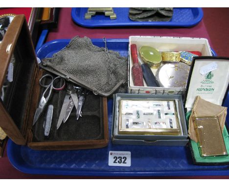 A Mesh Link Evening Bag, (damages) powder compact, pill boxes, scissors, Ronson lighter, musical powder compact, etc:- One Tr