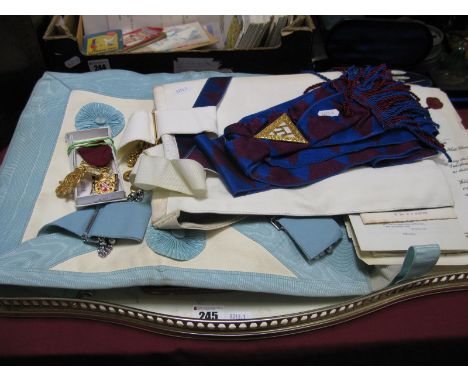 Masonic Interest; Aprons, sash, related ephemera, "Royal Masonic Benevolent Institution" Medallion, etc, contained in a brown