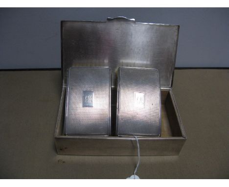 A Pair of Hallmarked Silver Backed Brushes, engine turned; together with a plated cigarette box. (3)