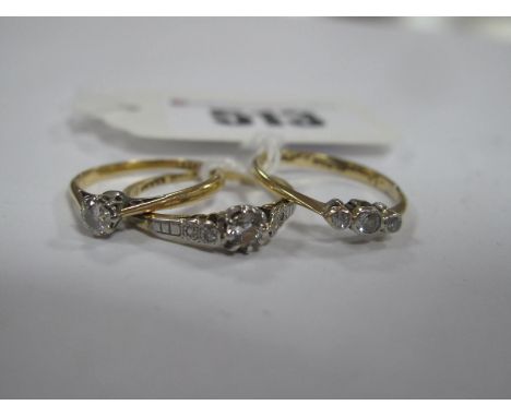 A Single Stone Diamond Ring, the brilliant cut stone claw set, between tapered shoulders, stamped "18ct Plat", another simila