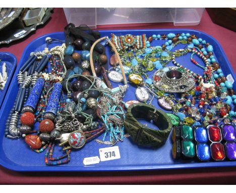 A Selection of Multi Bead Necklaces and Bracelets, a large circular Celtic style brooch, with hardstone style outer highlight