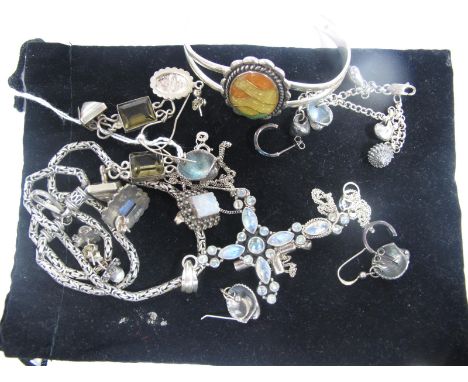A Moonstone Inset Cross Pendant, marquise and circular collet set on a fancy link chain; a charm bracelet, novelty shell pend