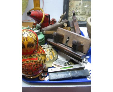 Russian Babushka Doll, vintage oil cans, wooden moulding plane, Fillister plane (?), cutthroat razor, spirit level, postcards