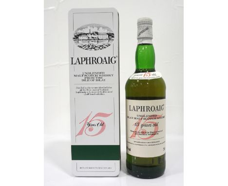 LAPHROAIG 15YO PRE ROYAL WARRANTBefore the Prince of Wales' Feathers started appearing on the bottles D. Johnston & Co., (Lap