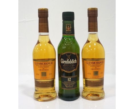 GLENMORANGIE AND GLENFIDDICHHave you ever thought, "If only I had a half bottle of whisky to take with me..."?  Two bottles o