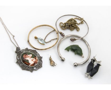 A small collection of costume jewellery, including a silver and enamel drop pendant, a pair of rose quartz earrings, another 