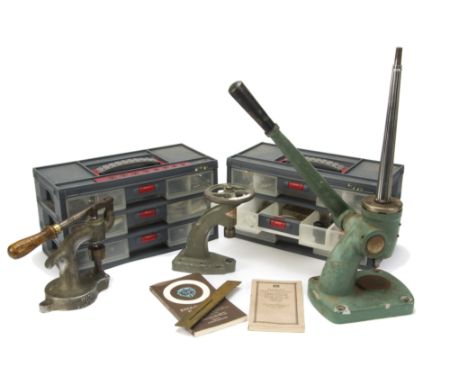 A collection of vintage watch and clock repairers tools and parts, including a Tissot Seastar Seven glass removal set in box 