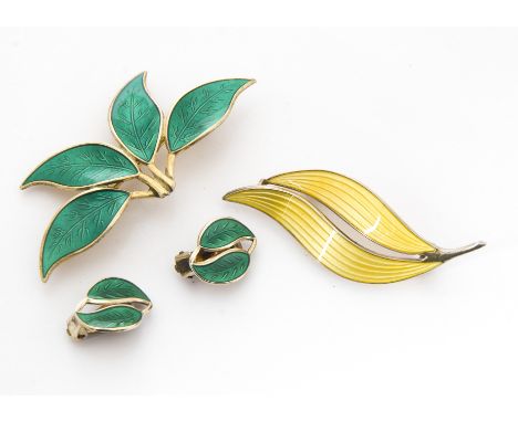 A David Andersen silver and enamel leaf brooch, and clip earrings marked to reverse together with a Norwegian silver and enam