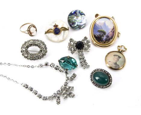 Two items of jewellery, including an Alpine scene enamel brooch in gold brooch or pendant mount, a 9ct gold and cameo ring, a