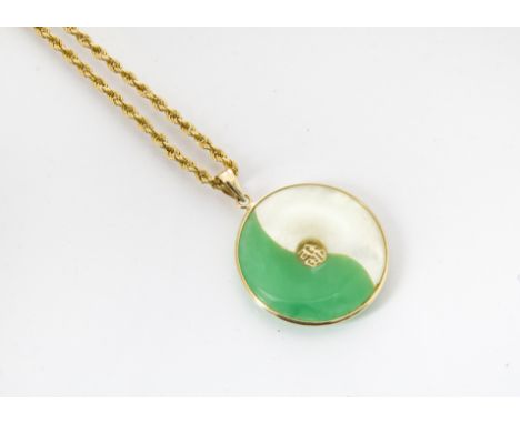 A modern jade and mother of pearl pendant, on 18ct gold rope twist chain with 9ct gold clasp, 7.9g 