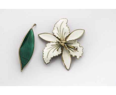 A David Andersen silver and enamel leaf brooch, (af) together with a Norwegian silver and enamel orchid brooch in white 