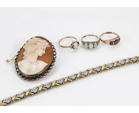 Two 9ct gold and opal rings, together with a 9ct gold and synthetic ruby ring, a silver and gold mounted cameo and a modern s