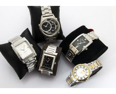 A group of five modern fashion watches, all boxed, including a Ben Sherman, Gucci, Storm, Pierre Cardin and a Rotary (5) 