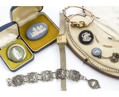 A collection of costume jewellery, including four Jasperware Wedgwood brooches/pendants, a cased string of simulated pearls, 