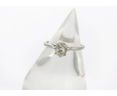 A diamond solitaire ring, the old cut diamond in claw setting on a white metal unmarked shank, diamond 1.08ct, ring size K 1/