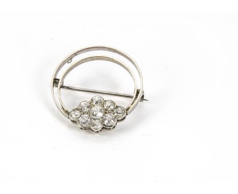 An Edwardian and later diamond brooch, the later 18ct white gold double hoop mount with a panel of nine old cut stones, 4.4g 