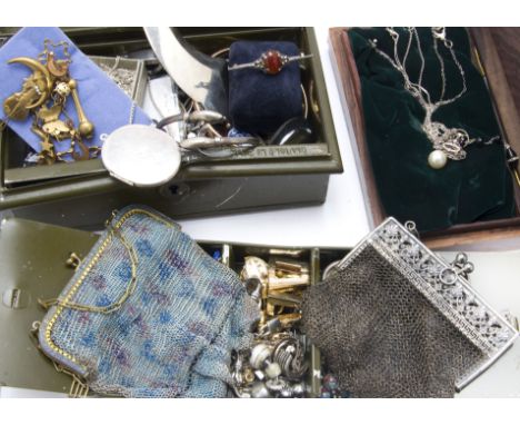 A collection of vintage and modern jewellery, including a 925 marked dolphin bangle, a rolled gold bangle, a 925 marked brooc