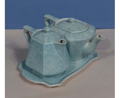 A vintage teapot and hot water pot set