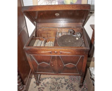 A vintage oak cased record player 