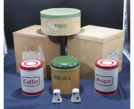 A collection of vintage kitchen canisters