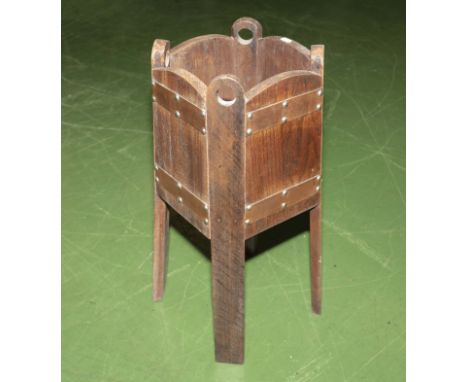 An Arts and Crafts oak planter
