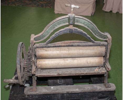 A cast iron vintage mangle