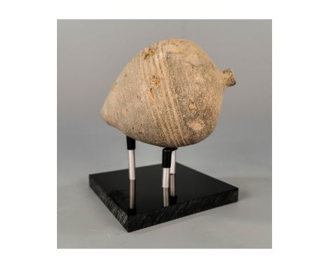 Ca.800 AD. A hollow ceramic vessel with the barrel-shaped body; domed top and conical base; Good Condition; Size: 140x90mm;5.