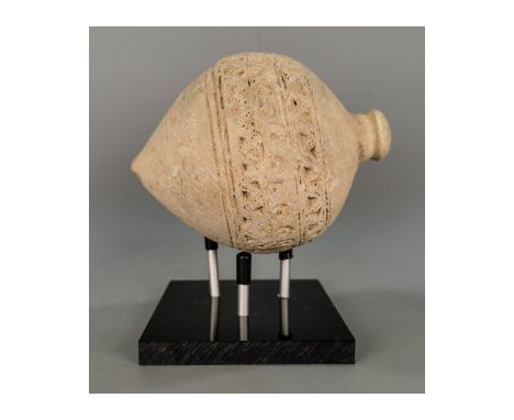 Ca.800 AD. A hollow ceramic vessel with the barrel-shaped body; domed top and conical base;Good Condition; Size: 145x100mm 5.