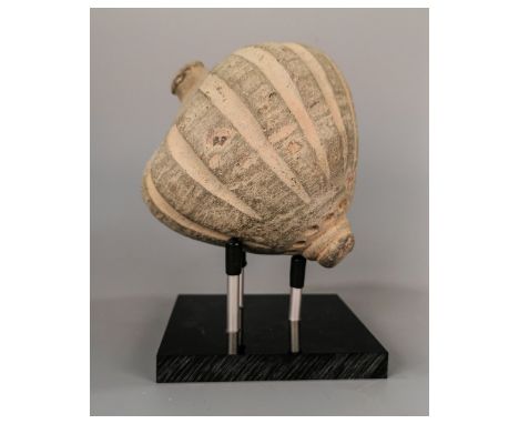 Ca.800 AD. A hollow ceramic vessel with the barrel-shaped body; domed top and conical base;Good Condition; Size: 150x130mm;5.