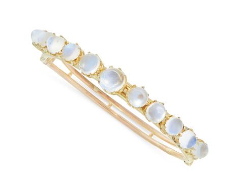 AN ANTIQUE MOONSTONE BANGLE in yellow gold, set with eleven graduated cabochon moonstones, unmarked, inner diameter 5.6cm, 14