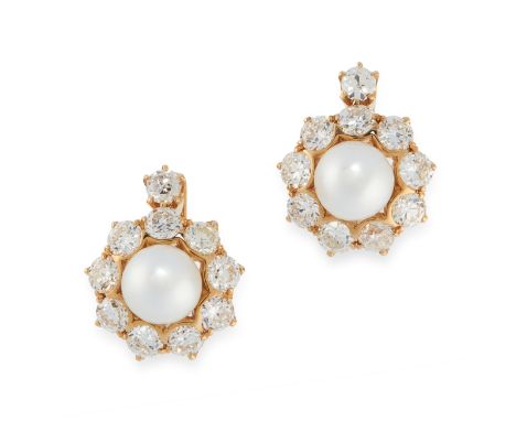 A PAIR OF PEARL AND DIAMOND CLUSTER EARRINGS each set with a pearl of 6.3mm and 6.2mm, within borders of old cut diamonds, th