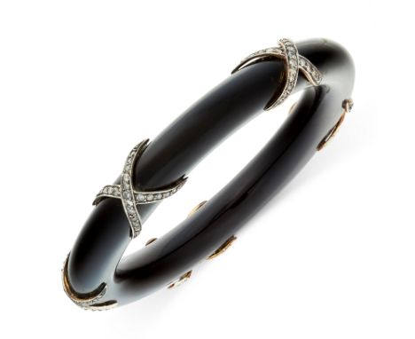 A DIAMOND AND WOOD BANGLE the body formed of a single piece of polished wood with black lacquer decoration, accented by five 