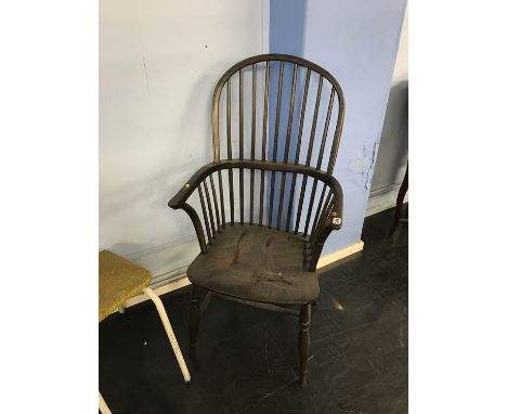 A stick back Windsor chair
