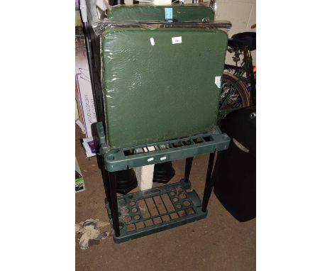 A garden tool caddy and a quantity of garden cushions