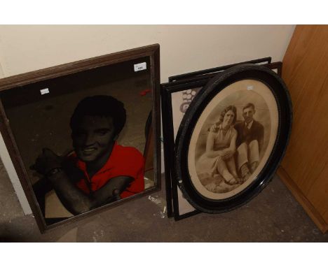 An Elvis mirror together with a quantity of assorted prints