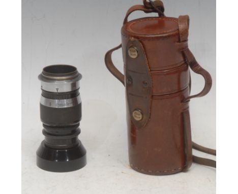 An Ernst Leitz Wetzlar camera lens, Elmar, f=9cm 1:4, no.296890, B.D.B 34mm hood, 10.5cm, Zeiss Ikon cylindrical stitched bro